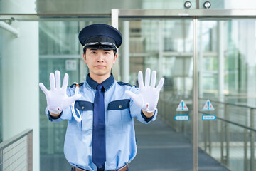 ブロックする警備員