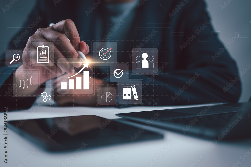 Poster Businessman or Analyst working with Business Analytics and Data Management System on virtual screen, make a report with KPI and metrics. Corporate strategy for finance, operations, sales, marketing.