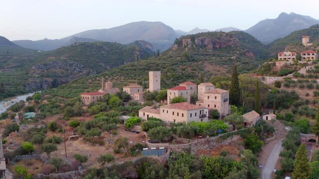 4K aerial - a bird's eye view&nbsp;video (Ultra High Definition) of Mourtzinos Tower. Captivating evening cityscape of Kardamyli town,  region of Messenia on Mani Peninsula, Greece.