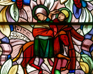 Naklejka premium Stained glass of the Escape to Egypt. Vitrail de la fuite en Egypte. Annecy - France