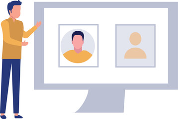 The boy is standing in front of the monitor.