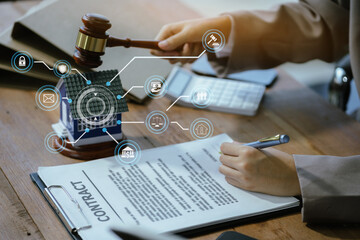 Justice and law concept. Real Estate Law in a courtroom the gavel, working with digital tablet...
