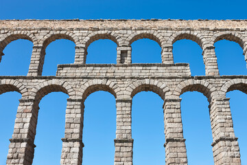 Fototapeta premium Roman aqueduct in Segovia. Landmark european engineering work. Spain