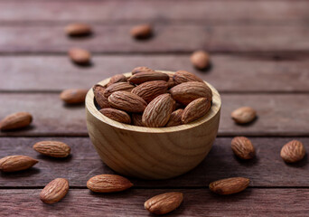 Almond snack fruit in wooden bowl