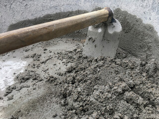 Construction concept, The mixing of stone, Cement, Sand together to make a strong concrete building