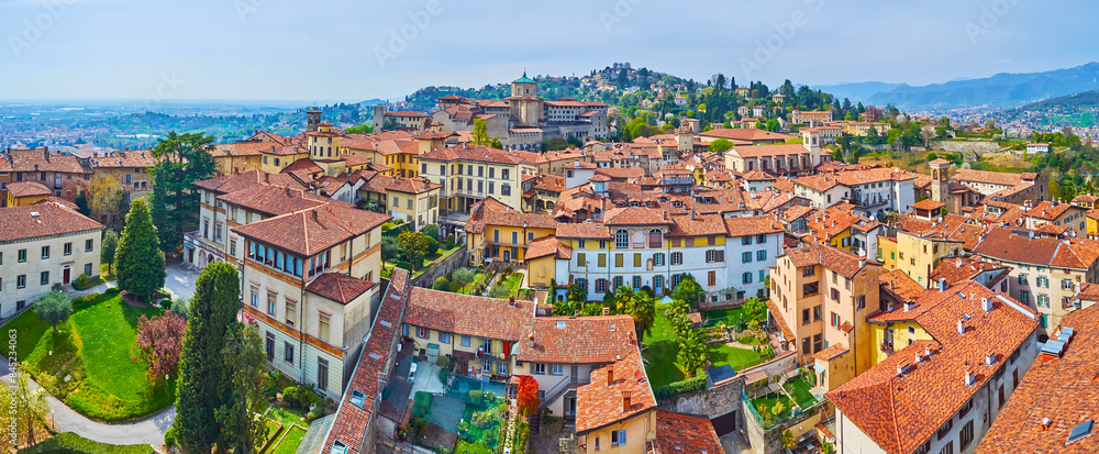 Poster Historic housing of Citta Alta against the San Vigilio Hill, Bergamo, Italy