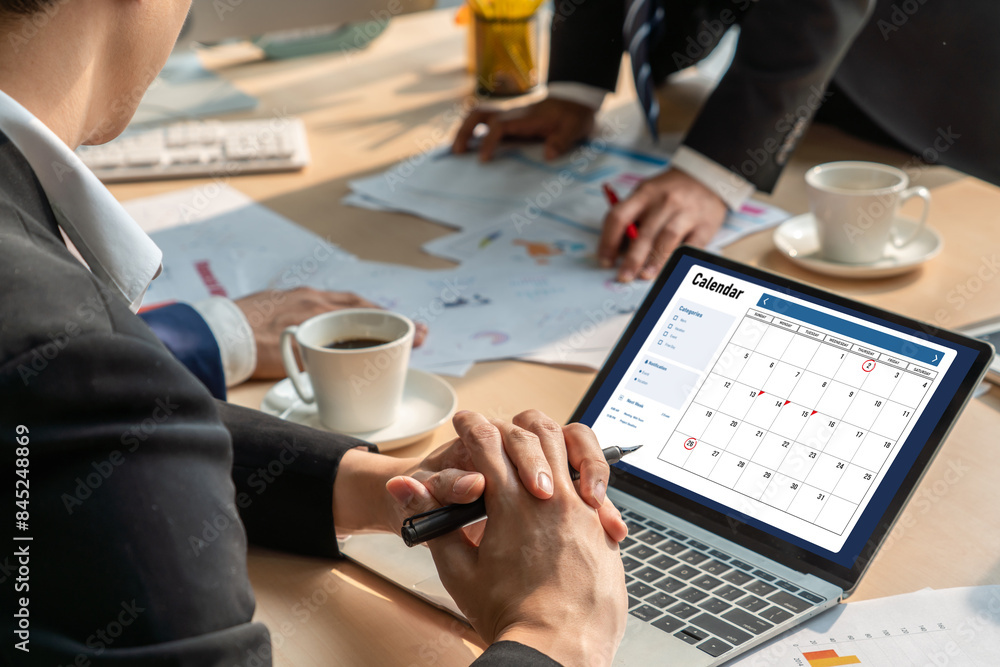 Poster calendar on computer software application for modish schedule planning for personal organizer and on