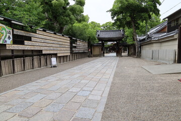 A Japanese shrine : a scene of the access and the entrance gate to the precincts of Kumata-jinjya Shrine in Osaka City in Japan