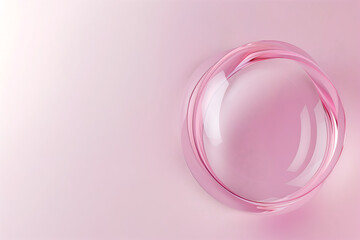 Obraz premium Circle shape in glass effect on pink color background for product presentation.