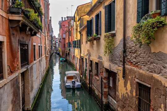 Italy, Veneto, Venice, Houses along narrow canal