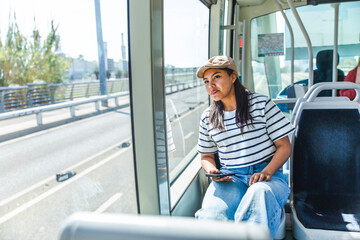 Young woman sitting in bus