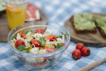 Healthy salat on vegan outdoor party. Mini picnic 