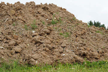 A large pile of dirt and clay.