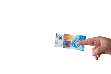 One one hundred Swiss francs cash banknote or bill held by Caucasian male hand. Close up studio shot, white background