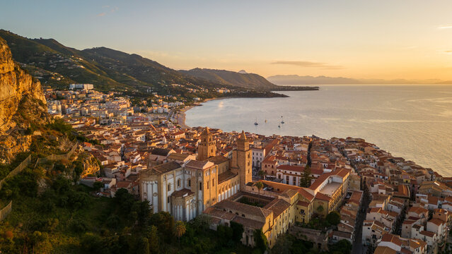 cefalu, sicily, italy Mediterranean Sea aerial sunset view drone above beach and historical old town 