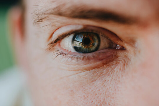 Close-up of man eye and face