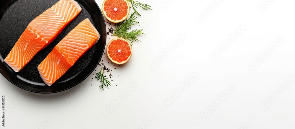 Aufkleber A fresh salmon fillet steak being cooked in a pan captured from above on a white background with plenty of empty space for any additional images or text