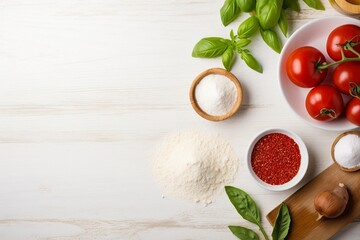 The ingredients for homemade pizza on white wooden background.