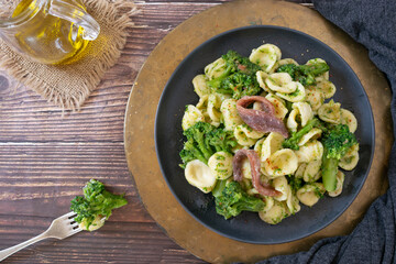 Orecchiette pasta with broccoli, anchovies and chilli pepper, traditional Italian dish from the Puglia region