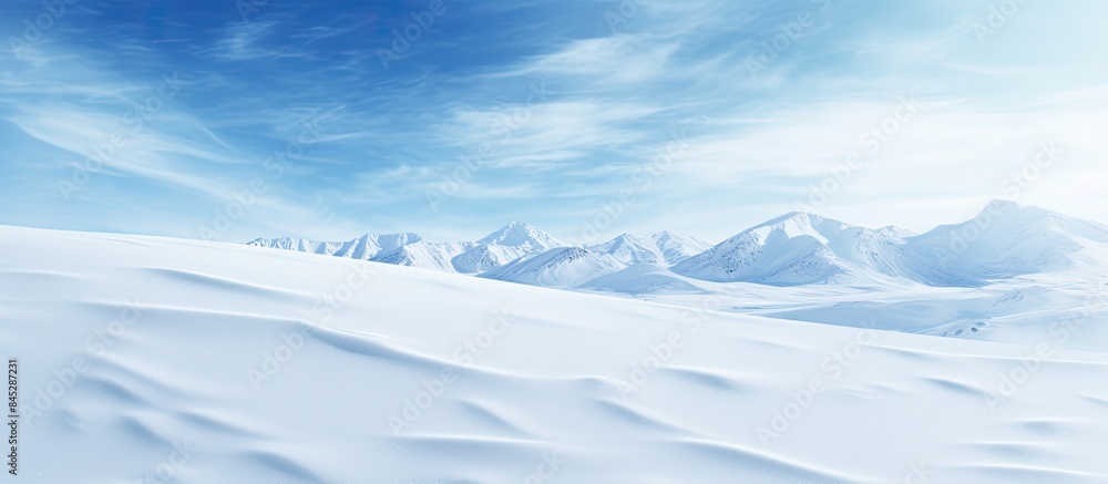 Poster A stunning winter backdrop showcasing a snow covered ground with a natural snow texture adorned with wind formed patterns on the snow surface Perfect for creative projects with copy space image