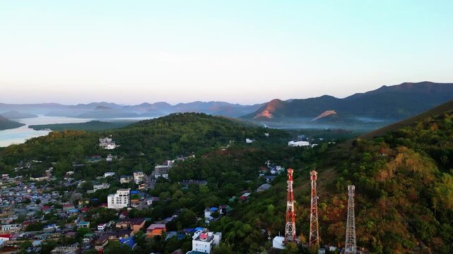 Aerial Drone Pan Left Mount Tapyas To Coron Harbor And Mountains