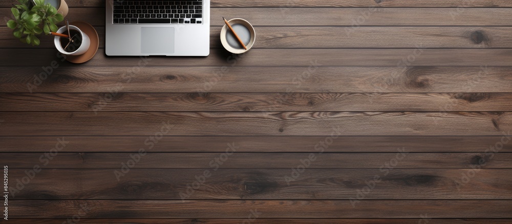 Aufkleber the image showcases a wooden background with a laptop computer office supplies and a desk table it p