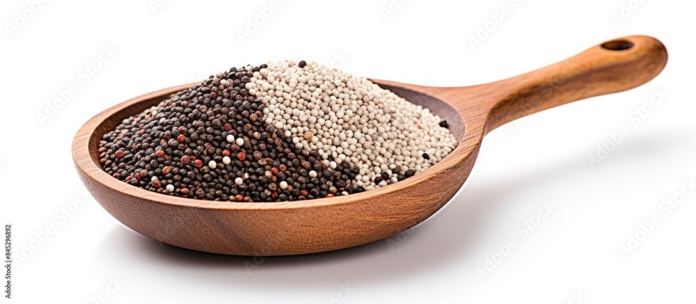 Poster a wooden spoon holds a mix of black red and white quinoa along with chia seeds the image is isolated