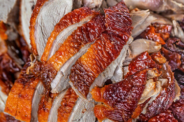 Slices of roast duck with sauces 