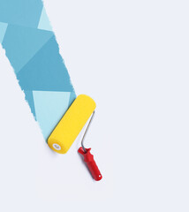 Paint roller painting a pattern on a wall © stokkete