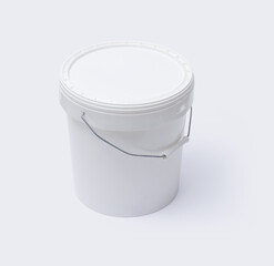 Large plastic paint bucket isolated