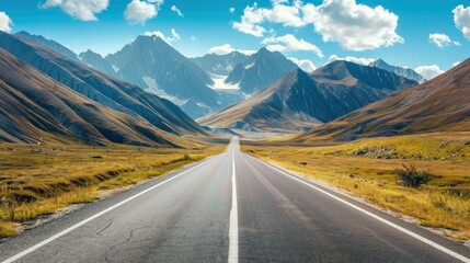 Fototapeta premium Empty highway between mountain peaks, clear sunny day, incredible nature, bright saturated colors