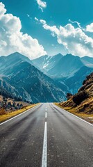 Naklejka premium Empty highway between mountain peaks, clear sunny day, incredible nature, bright saturated colors