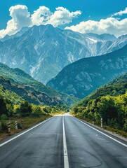 Naklejka premium Empty highway between mountain peaks, clear sunny day, incredible nature, bright saturated colors
