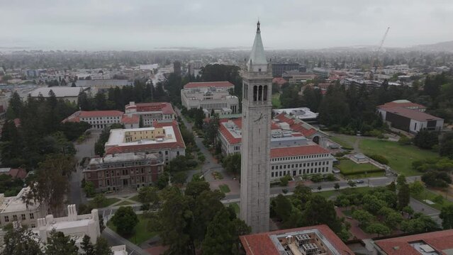 another flying in a curve past Campanile tower on UC Berkeley campus