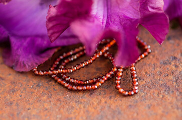 Garnet is a natural stone used to make jewelry.
