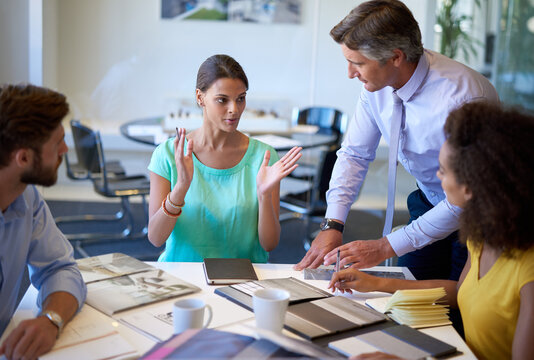 Creative, team or business people with manager for discussion, coaching or brainstorming in startup. Group, planning or strategy for project, collaboration or solution of interior designer in meeting