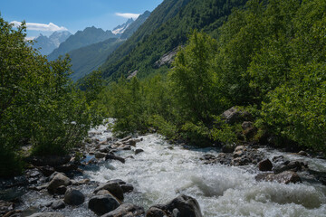 The sources of the Alibek River flowing down from the mountain slopes of the North Caucasus on the...