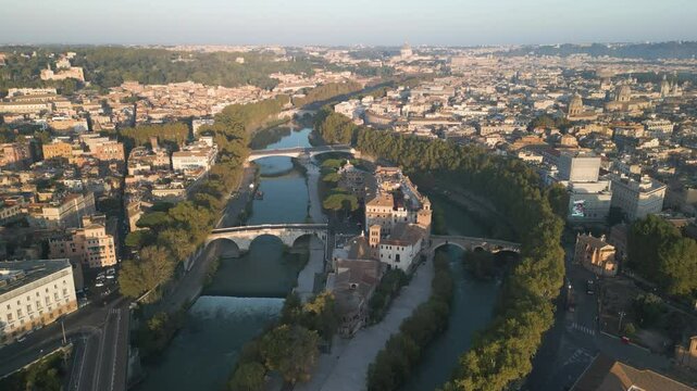 Old historic Roman bridges cross river connecting Orange Garden district of Italy
