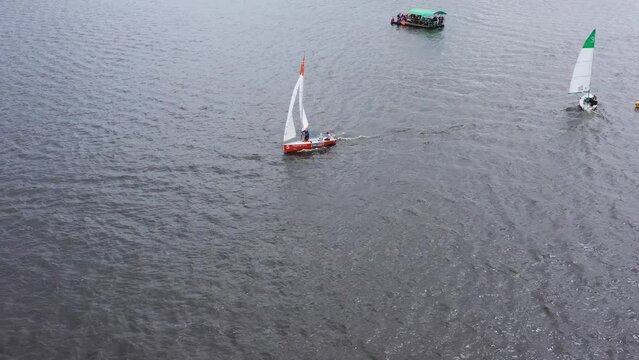 Aerial view of sailing yacht. Sailing regatta. Flying over yachts