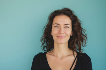 Fototapeta premium A close up portrait of a woman with a subtle smile