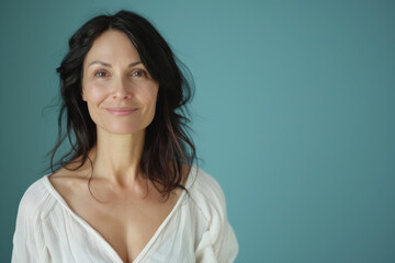 Fototapeta premium A close up portrait of a woman with a subtle smile