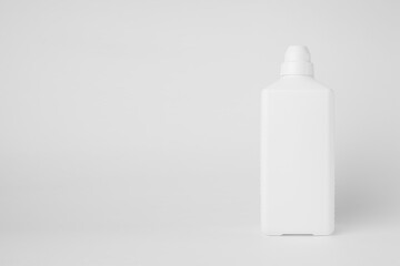 White plastic bottle mockup, front view standing on white background. Bottle template for washing, sanitizer, cleanser, medicine cosmetic for design, advertising, branding, displaying. .