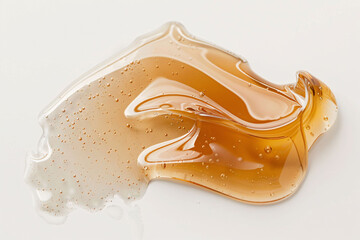 Close-up texture of cosmetic gel, macrophotography of facial serum with air bubbles.