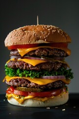 Giant Stacked Cheeseburger with Multiple Beef Patties, Bacon, and Fresh Vegetables