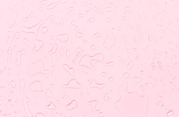 Abstract water drops on pink background, pink water drops pattern background