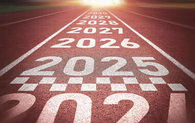 Start of new year. Changes of year 2025, 2026, 2027 on Running track. Concept of new ideas starting...
