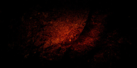 Dark and mysterious rock texture with deep red and black tones, creating a dramatic and intense background. Perfect for use in design projects that require a bold and moody aesthetic