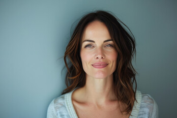 Fototapeta premium A close up portrait of a woman with a subtle smile