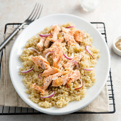 Hot smoked salmon with quinoa and red onion