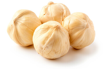 Close-up of shelled and unshelled Candlenuts isolated on a white background, showcasing their texture